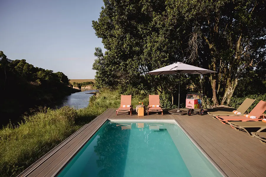 Pool with river view at Emboo Camp